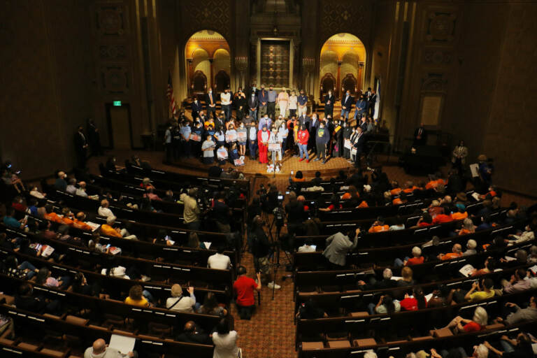 Activists, politicians, and faith leaders gather for a rally at Congregation Rodeph Shalom in Philadelphia, calling for legislators to act to stop gun violence. (Emma Lee/WHYY)