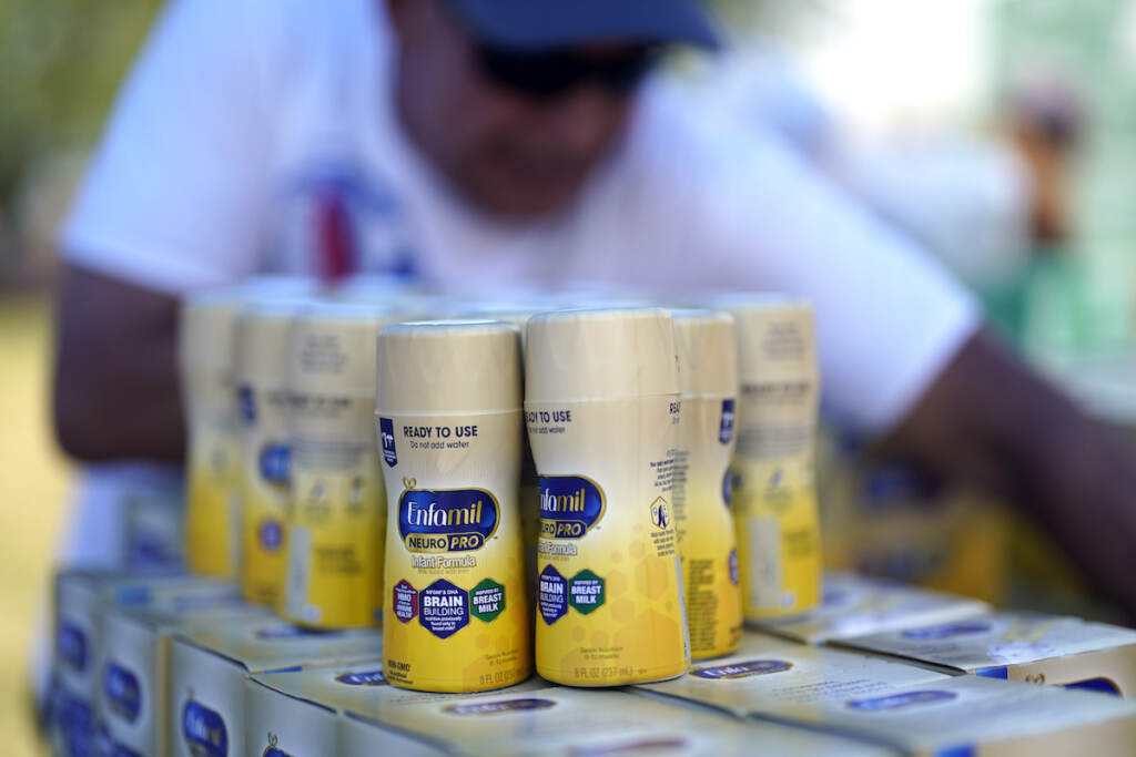 Infant formula Infant formula is stacked on a table during a baby formula drive to help with the shortage Saturday, May 14, 2022, in Houston. (AP Photo/David J. Phillip)