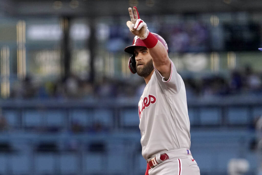 Bryce Harper Philadelphia Phillies' Bryce Harper gestures toward his dugout after hitting a double during the first inning of a baseball game against the Los Angeles Dodgers Saturday, May 14, 2022, in Los Angeles. (AP Photo/Mark J. Terrill)