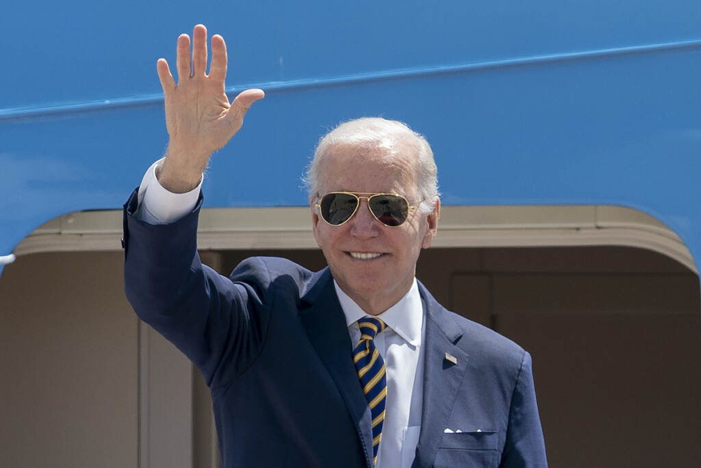 China Military Exercises President Joe Biden waves as he boards Air Force One for a trip to South Korea and Japan, Thursday, May 19, 2022, at Andrews Air Force Base, Md. (AP Photo/Gemunu Amarasinghe)