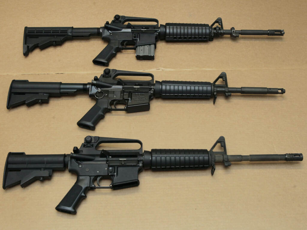 California Gun Rights Lawsuit Three variations of the AR-15 assault rifle are displayed