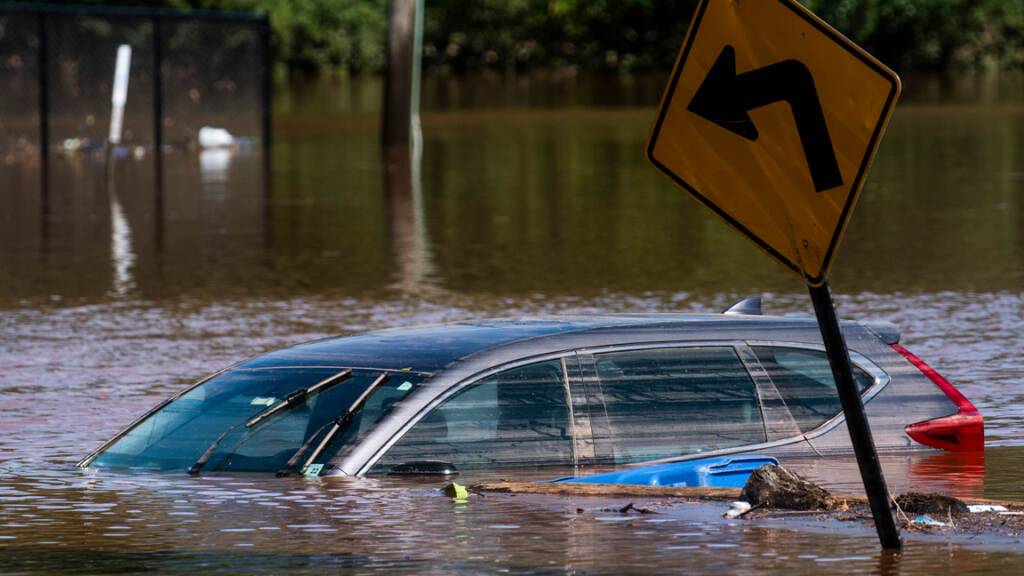 Flooding-Tropical-Storm-Ida-Somerville-Sept.-2-2021 A car caught in a flooded road in Somerville in Tropical Storm Ida. (AP Photo/Eduardo Munoz Alvarez)