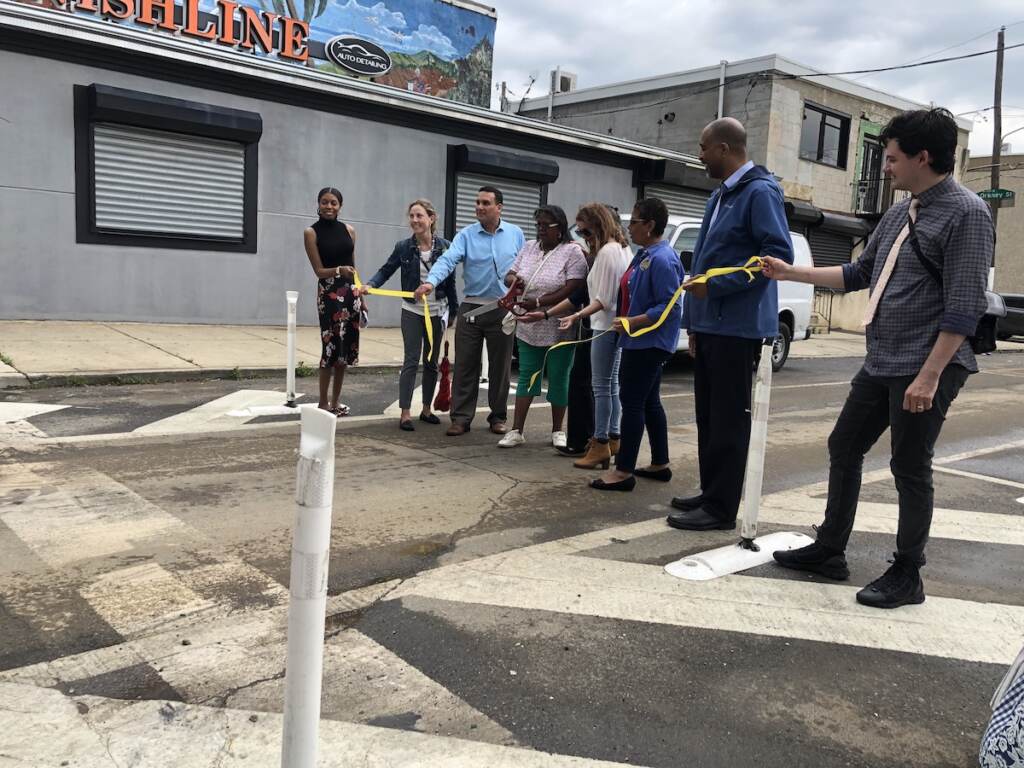 IMG_8077 City officials and community members cut the ribbon on the city's first ''slow zone'' in Fairhill. (Sophia Schmidt/WHYY)