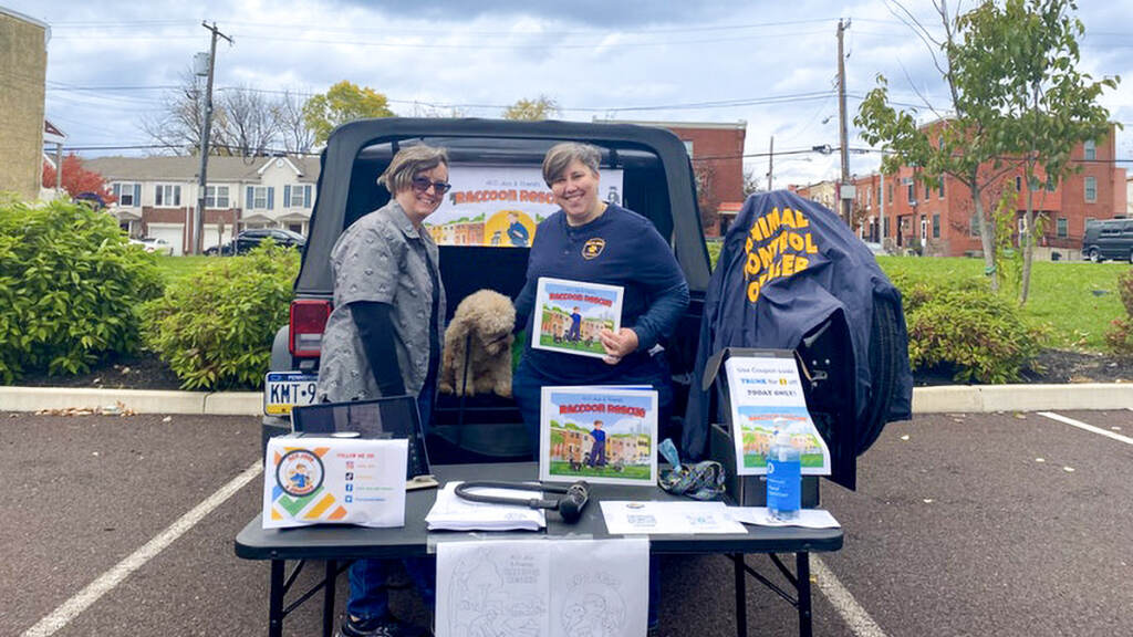 acojess-animalcontrol-book Author and animal rescue officer Jess Thedinga (right) at a Philly book event.