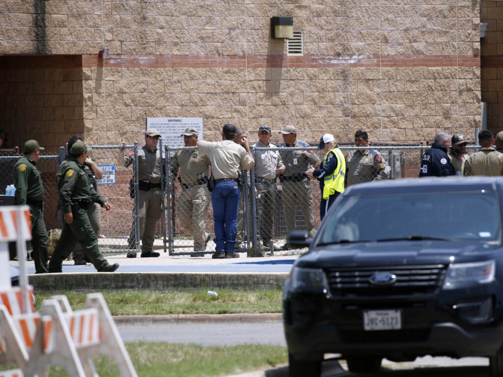 Law enforcement and first responders gather outside Robb Elementary School following Tuesday’s shooting in Uvalde, Texas. Their response has since come under wide scrutiny. Law enforcement and first responders gather outside Robb Elementary School following Tuesday's shooting in Uvalde, Texas. Their response has since come under wide scrutiny. (Dario Lopez-Mills/AP)