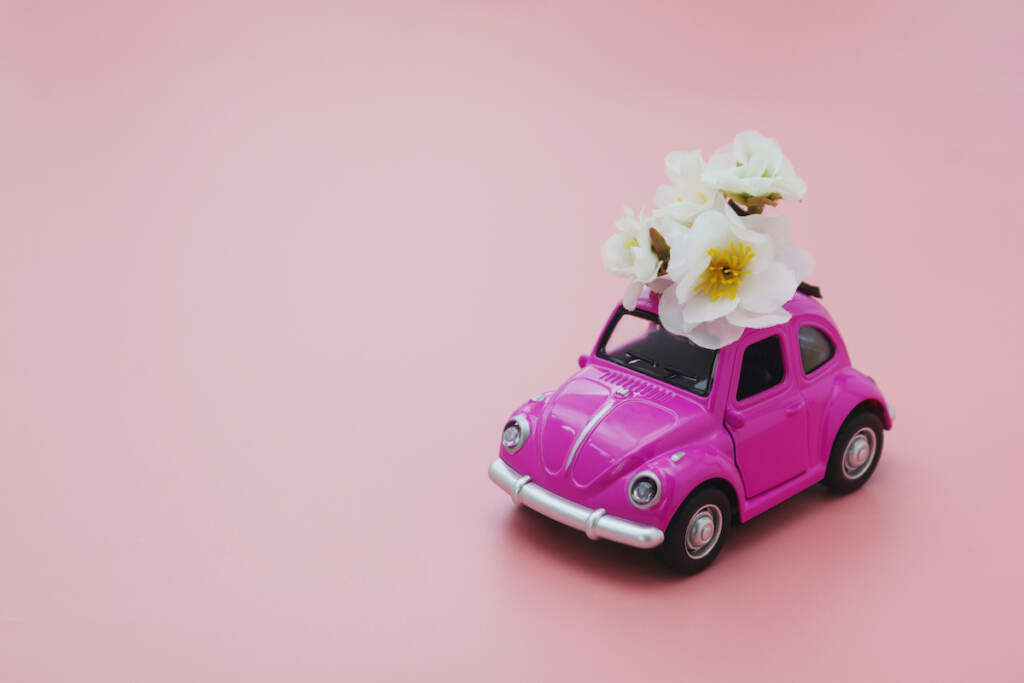 Corby, U.k. February 7, 2020. Miniature Pink Toy Car With Spring, Summer Flowers, On Pink Background (Big Stock)