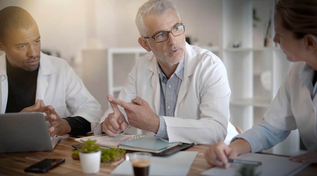 doctor on a work meeting in a meeting room in a hospital doctors on a work meeting in a meeting room in a hospital