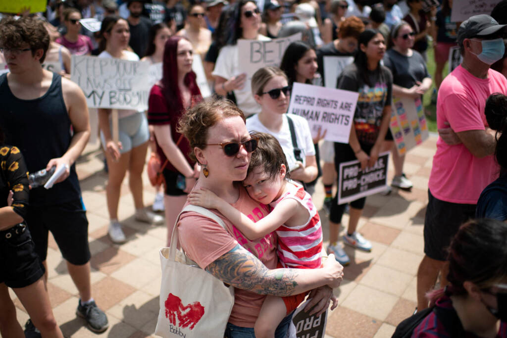 An attendee holds her child during A Texas Rally for Abortion Rights at Discovery Green in Houston, Texas, on May 7. Recently passed laws make abortion illegal after about six weeks into a pregnancy. An attendee holds her child during A Texas Rally for Abortion Rights at Discovery Green in Houston, Texas, on May 7. Recently passed laws make abortion illegal after about six weeks into a pregnancy.