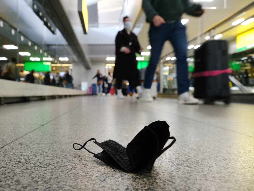 A mask lies on the ground at John F. Kennedy International Airport in New York City on April 19. A mask lies on the ground at John F. Kennedy International Airport in New York City on April 19. (Spencer Platt/Getty Images)