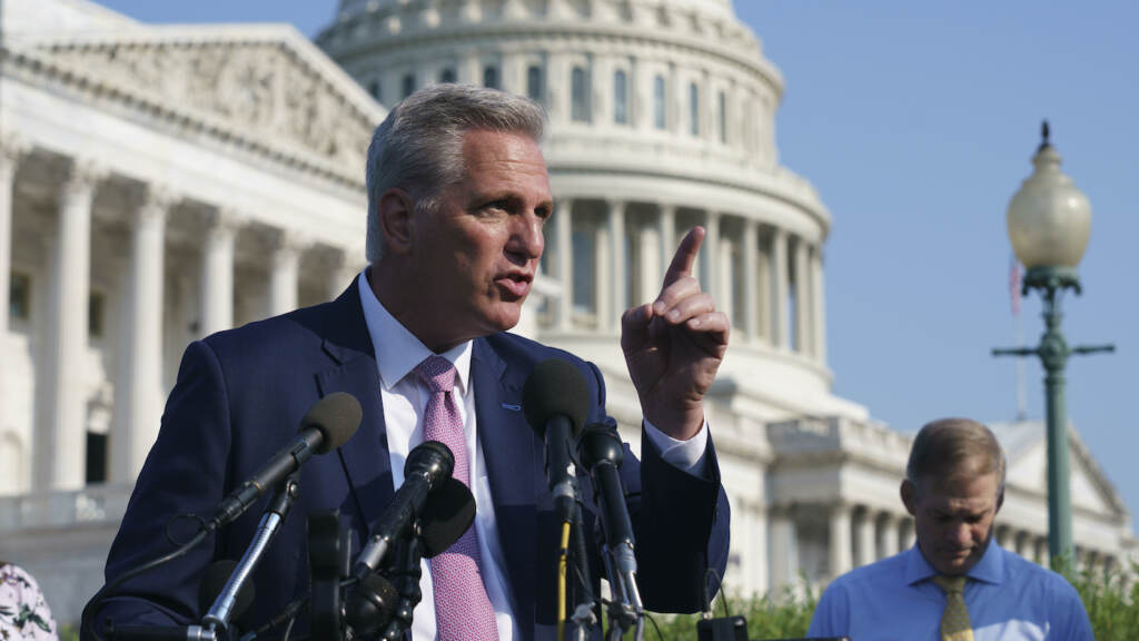 Kevin McCarthy, Jim Jordan House Minority Leader Kevin McCarthy gestures from a podium