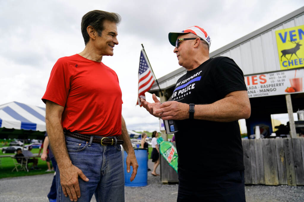 Election 2022 Mehmet Oz speaks with a campaign event attendee