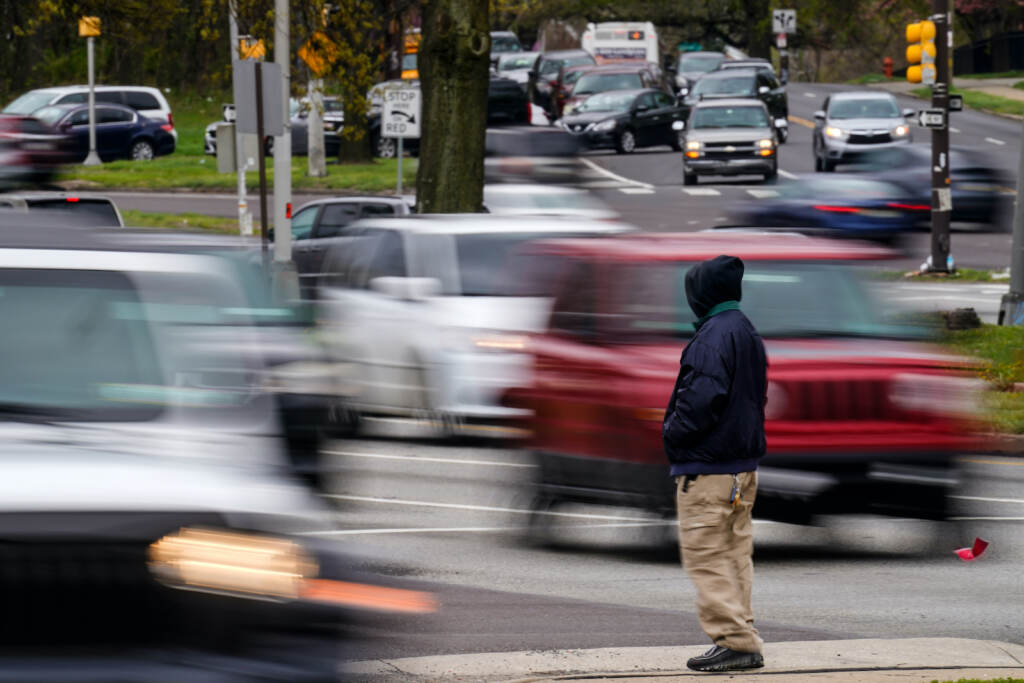 Traffic Fatalities Inequality A pedestrian waits to cross Roosevelt Boulevard