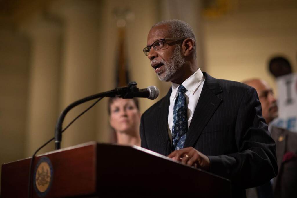 senator-art-haywood-bill-police-killings State Senator Art Haywood speaks at a podium.