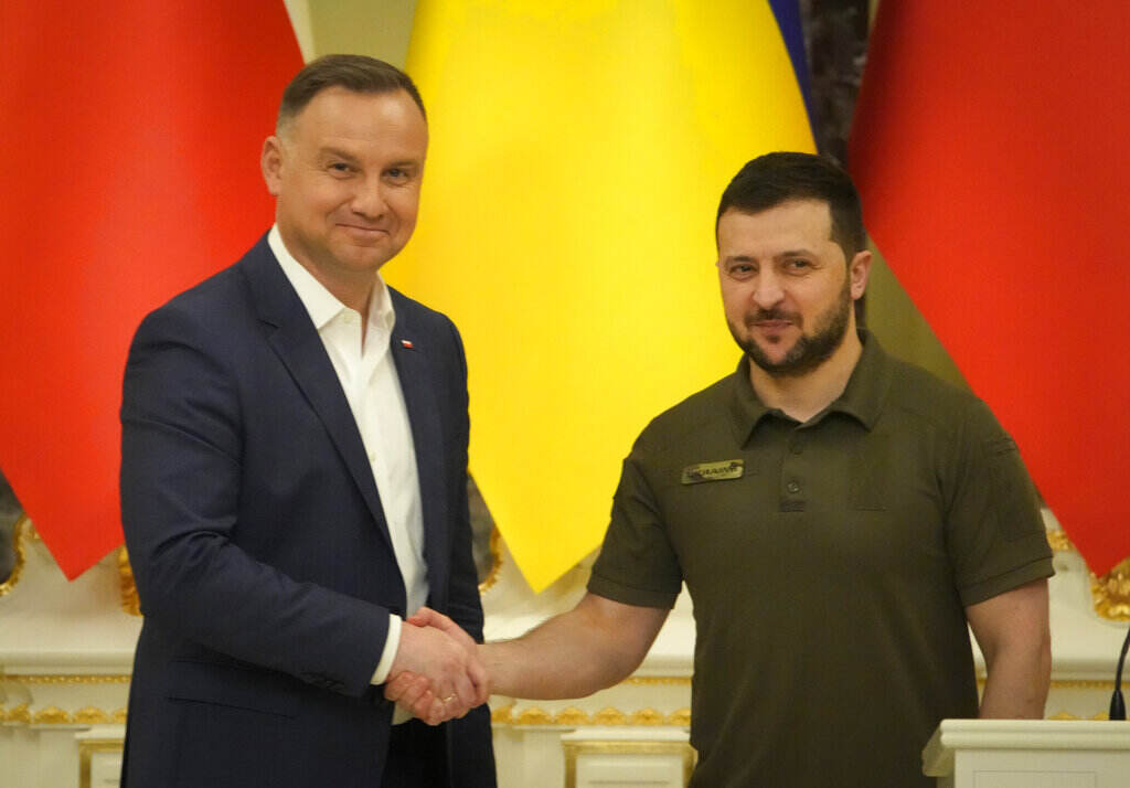 Russia Ukraine War Poland The Polish president shakes hands with Ukrainian President Zelenskyy in Kyiv.