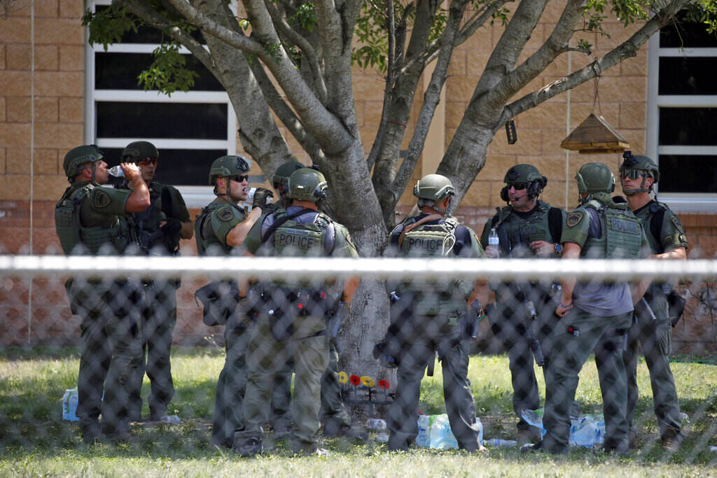 Texas School Shooting – Security Law enforcement personnel are gathered outside of the school following the mass shooting in Uvalde, Texas.