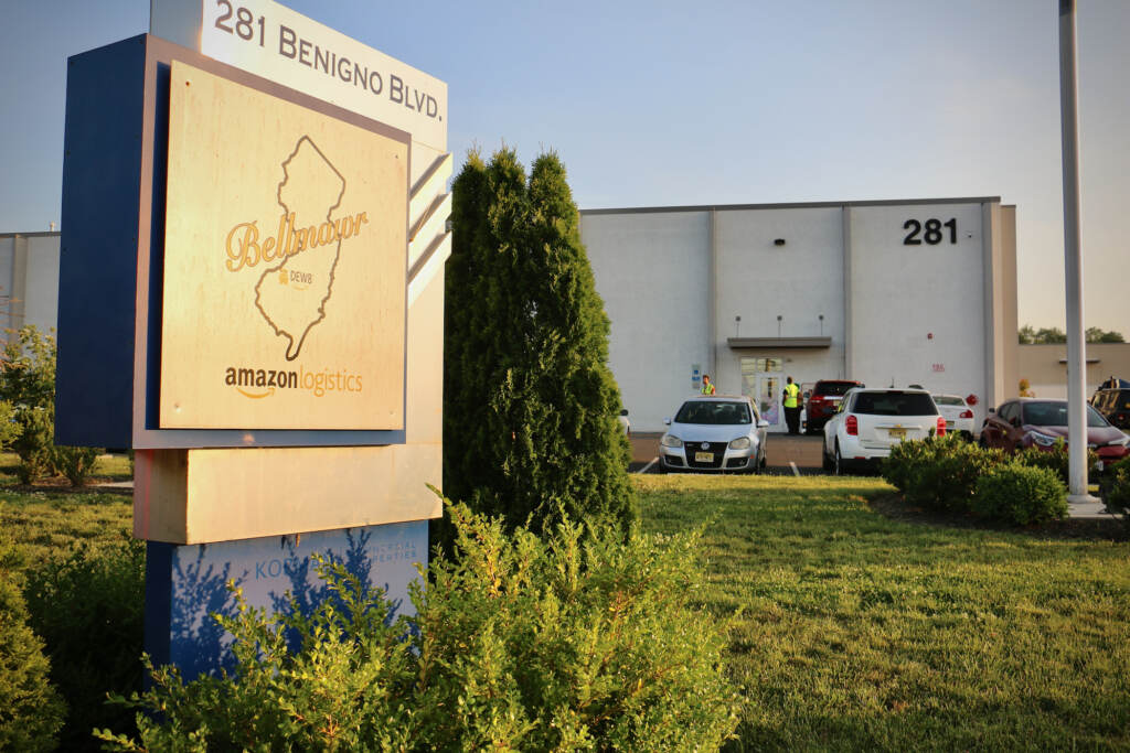 2022 06 01-e lee-bellmawr nj amazon dew8-workers walk out over planned closure sign Amazon workers participate in a walkout at the company's Bellmawr, N.J., facility.