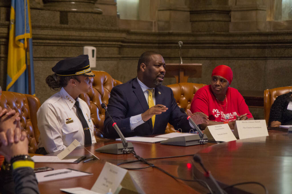 2022 06 09 k paynter johnson gun violence hearing kenyatta johnson danielle outlaw (1 of 1)-2 Philadelphia Police Commissioner Danielle Outlaw (left) briefly joined council member Kenyatta Johnson (center), other lawmakers and activists at a meeting to talk about solutions to gun violence in the city on June 9, 2022. (Kimberly Paynter/WHYY)