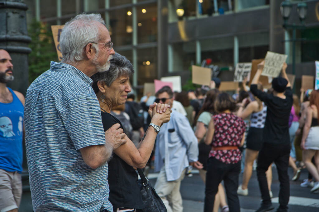 2022 06 24 kpaynter roe v. wade overturn protest (1 of 9) Emotional onlookers thank protesters marching down Market Street in support of abortion rights on June 24, 2022. (Kimberly Paynter/WHYY)