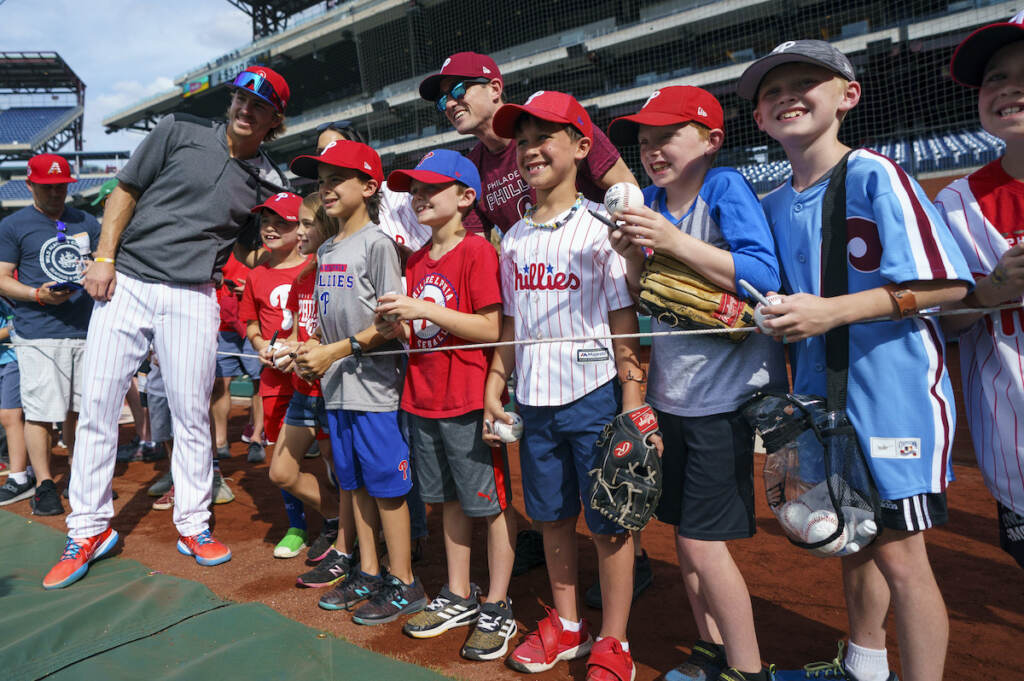 Diamondbacks Phillies Baseball Philadelphia Phillies' Bryson Stott, left, poses with West Chester'sCaden Marge, sixth from right, and a bunch of fans during warmups prior to a baseball game against the Arizona Diamondbacks, Friday, June 10, 2022, in Philadelphia. (AP Photo/Chris Szagola)