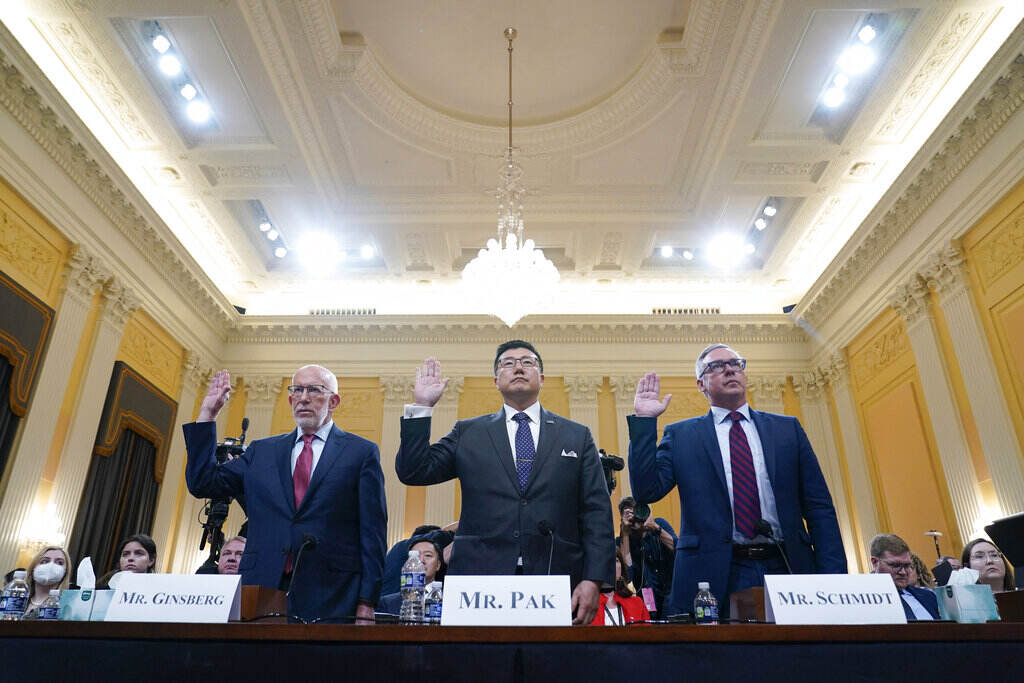 Benjamin Ginsberg, Washington attorney and elections lawyer, left, BJay Pak, former U.S. Attorney in Atlanta, center, and Al Schmidt, former city commissioner of Philadelphia, are sworn in to testify as the House select committee investigating the Jan. 6 attack on the U.S. Capitol continues to reveal its findings of a year-long investigation, at the Capitol in Washington, Monday, June 13, 2022. (AP Photo/Susan Walsh)