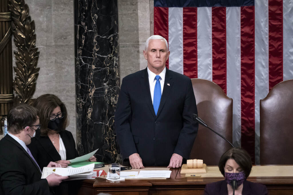 Mike Pence File photo: Vice President Mike Pence returns to the House chamber after midnight, Jan. 7, 2021, to finish the work of the Electoral College after a mob loyal to President Donald Trump stormed the Capitol in Washington and disrupted the process. (AP Photo/J. Scott Applewhite, File)