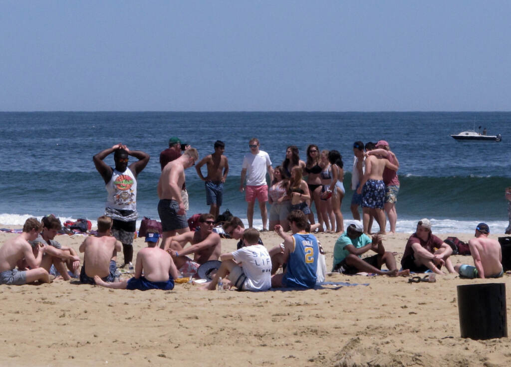 File photo: Beachgoers enjoy an afternoon on the sand in Point Pleasant Beach,N.J. (AP Photo/Wayne Parry)