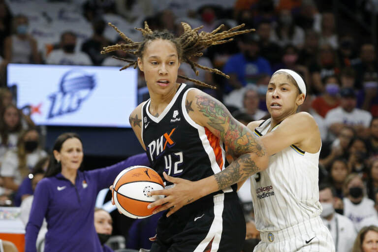 File photo: Phoenix Mercury center Brittney Griner (42) drives past Chicago Sky forward Candace Parker (3) during the first half of Game 1 of the WNBA basketball Finals, Sunday, Oct. 10, 2021, in Phoenix. (AP Photo/Ralph Freso, File)