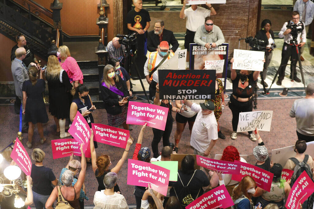 Supreme Court Abortion South Carolina Protesters who support more abortion restrictions and protestors who upset at the recent U.S. Supreme Court ruling removing protections for abortions demonstrate in the lobby of the South Carolina Statehouse on Tuesday, June 28, 2022, in Columbia South Carolina. (AP Photo/Jeffrey Collins)