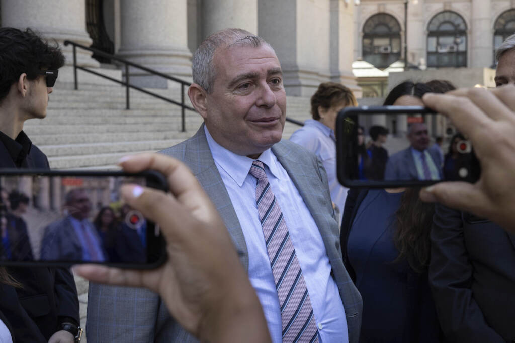 APTOPIX Giuliani Associates Indictment Lev Parnas, center, speaks to the media outside the federal courthouse in New York, Wednesday, June 29, 2022. (AP Photo/Yuki Iwamura)