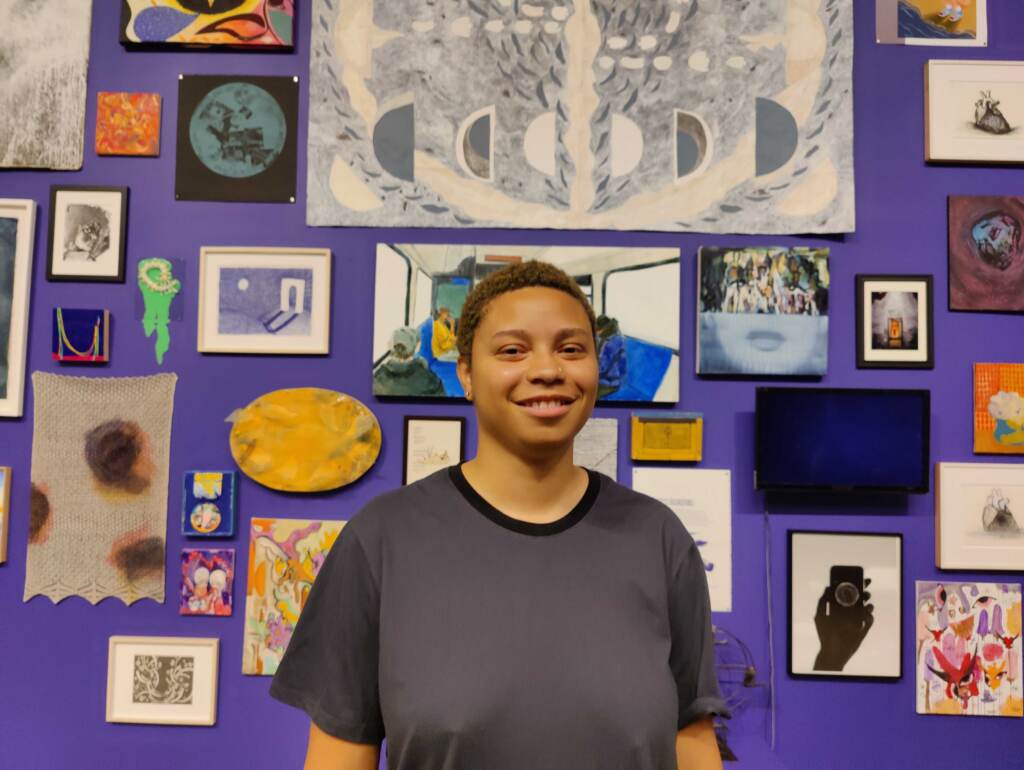 IMG20220623105506 S.N.A.I.L. Gallery curator Logan Cryer at the Icebox in Kensington. (Peter Crimmins/WHYY)