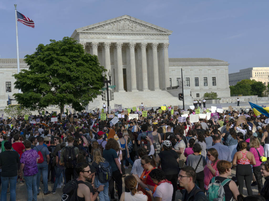 Abortion rights activists protest outside of the U.S. Supreme Court in Washington on May 3, a day after the leak of a draft opinion suggesting a possible reversal of Roe v. Wade. Abortion rights activists protest outside of the U.S. Supreme Court in Washington on May 3, a day after the leak of a draft opinion suggesting a possible reversal of Roe v. Wade. (Jose Luis Magana/AP)