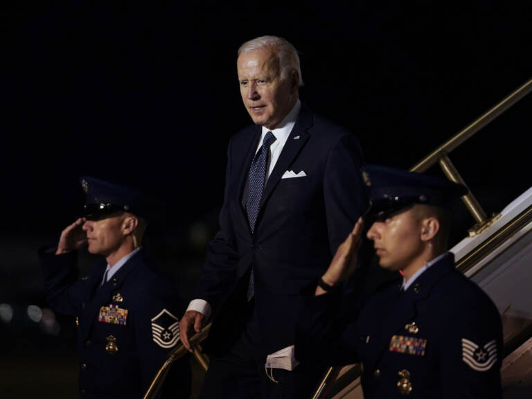 President Biden walks down the steps of Air Force One at Dover Air Force Base, Del., Thursday, June 2, 2022, as he heads to Rehobeth Beach, Del., for the weekend. A small plane flew near the Bidens' beach house. (Susan Walsh/AP)