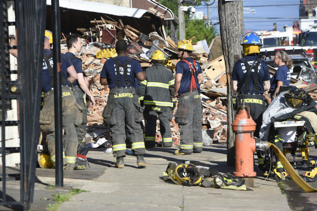 firefighter-buildingcollapse-01-1 Firefighters survey the scene of a building collapse at N. 3rd St and W. Indiana Ave. in the city's Fairhill section where a 27-year veteran firefighter died. (Jonathan Wilson for Billy Penn)