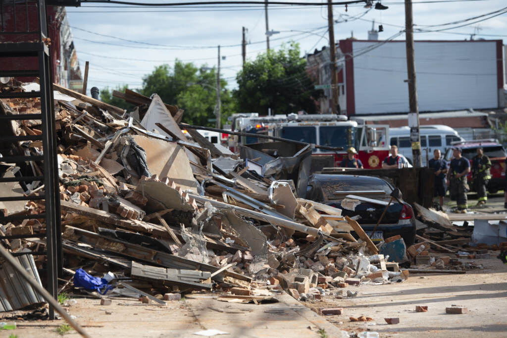 firefighter-buildingcollapse-03-1 Firefighters at the scene of a building collapse at N 3rd St and W Indiana Ave. in the city's Fairhill section where a 27 year veteran firefighter died. (Jonathan Wilson for Billy Penn)