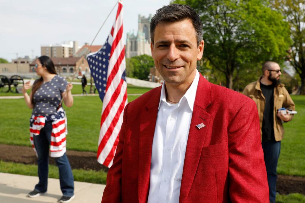 Ryan Kelly, a Republican candidate for governor, attends a rally in support of First Amendment rights and to protest against Gov. Gretchen Whitmer, outside the Michigan State Capitol in Lansing, Mich., on May 15, 2021. Ryan Kelly, a Republican candidate for governor, attends a rally in support of First Amendment rights and to protest against Gov. Gretchen Whitmer, outside the Michigan State Capitol in Lansing, Mich., on May 15, 2021. (Jeff Kowalsky/AFP via Getty Images)