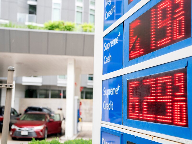 US-ECONOMY-INFLATION Gas prices are displayed on a sign