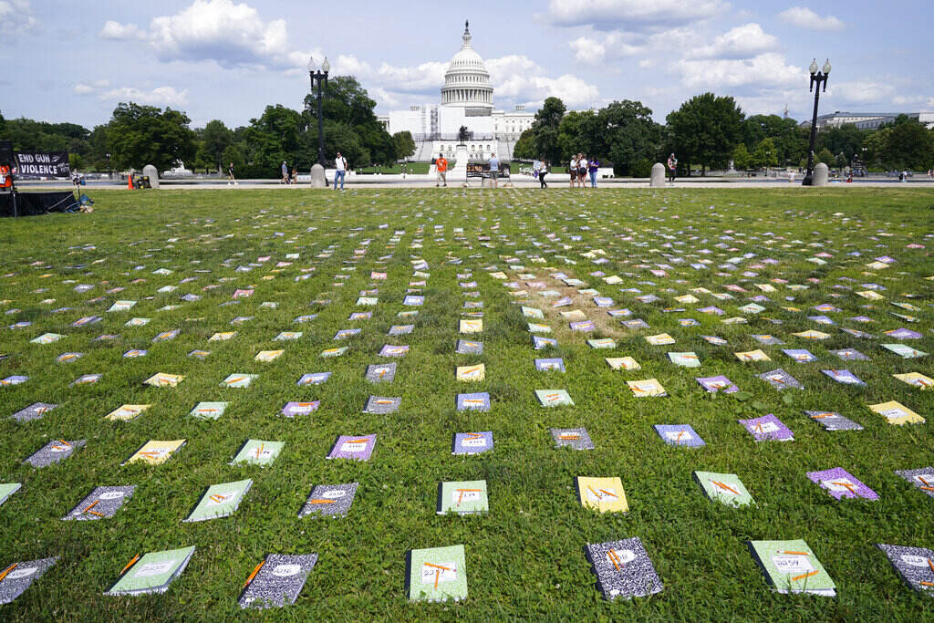 Congress Guns Laid out near the U.S. Capitol are 2,280 schoolbooks and broken pencils that represent the 2,280 children that have been killed by gun violence since the Senate has refused to bring a vote on background checks, during a rally in Washington, Friday, June 10, 2022.