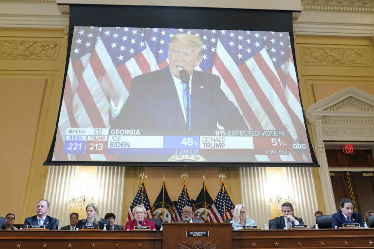 A video exhibit plays as the House select committee investigating the Jan. 6 attack on the U.S. Capitol continues to reveal its findings of a year-long investigation, at the Capitol in Washington