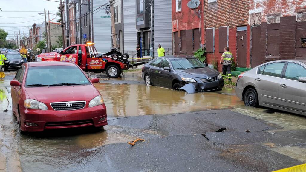 The scene of a water main break near Fourth and Hewson streets in Kensington.