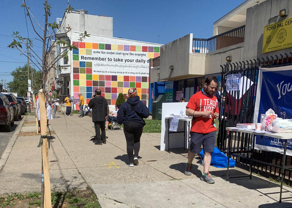 People line up outside a Philadelphia polling place in May 2022.