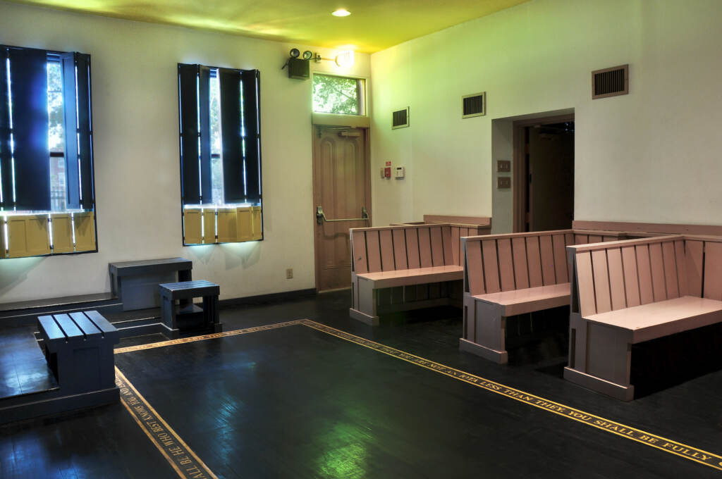 2013 05 30-provided-south philadelphia fleisher art memorial-louis kahn lecture room The Louis Kahn Lecture Room was designed by artist Siah Armajani for Fleisher Art Memorial in South Philadelphia. Elements include wooden benches and shutters and a quote from a Walt Whitman poem inlaid in the floor. (Courtesy of Fleisher Art Memorial)