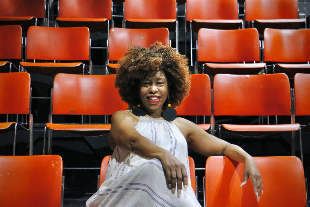 2022 07 27-e lee-zuhairah mcgill-philadelphia community education center-sojourner seated Zuhairah McGill sits in a theater