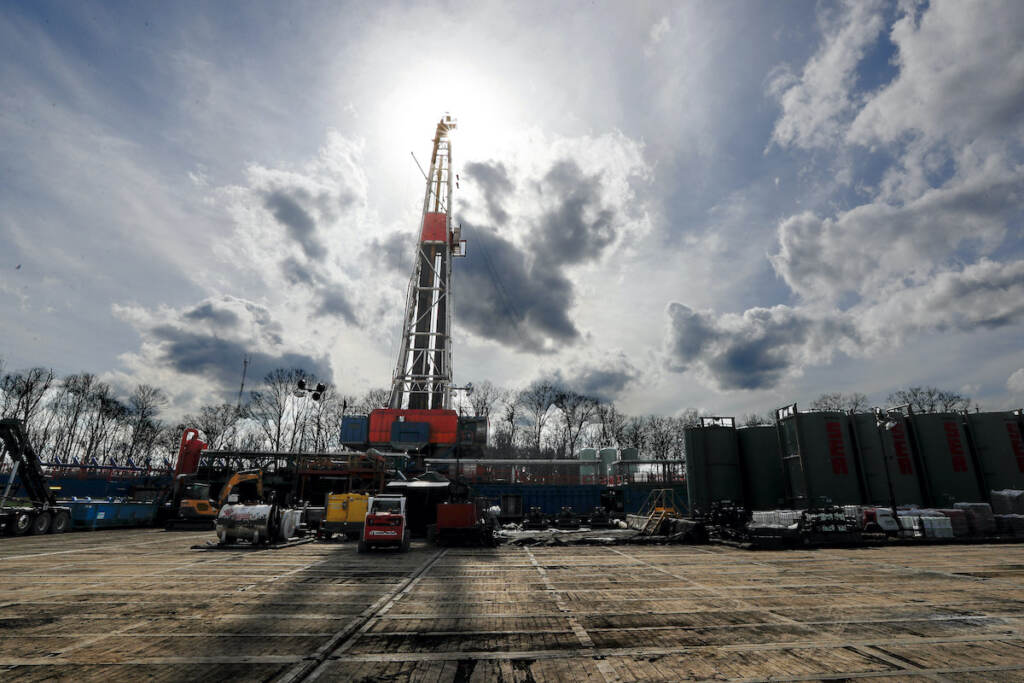 Trump-Methane Emissions In this March 12, 2020, file photo, the sun shines through clouds above a shale gas drilling site in St. Mary's, Pa. (AP Photo/Keith Srakocic, File)