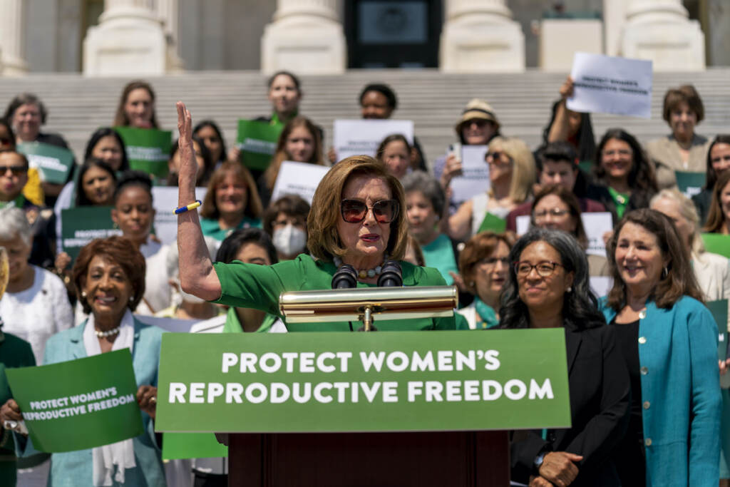 Nancy Pelosi House Speaker Nancy Pelosi of Calif., accompanied by female House Democrats, speaks at an event ahead of a House vote on the Women's Health Protection Act and the Ensuring Women's Right to Reproductive Freedom Act at the Capitol in Washington, Friday, July 15, 2022. (AP Photo/Andrew Harnik)