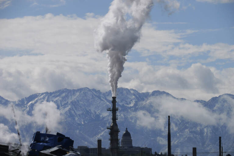 File photo: The Utah State Capitol, rear, is shown behind an oil refinery on Thursday, May 12, 2022, in Salt Lake City. (AP Photo/Rick Bowmer, File)