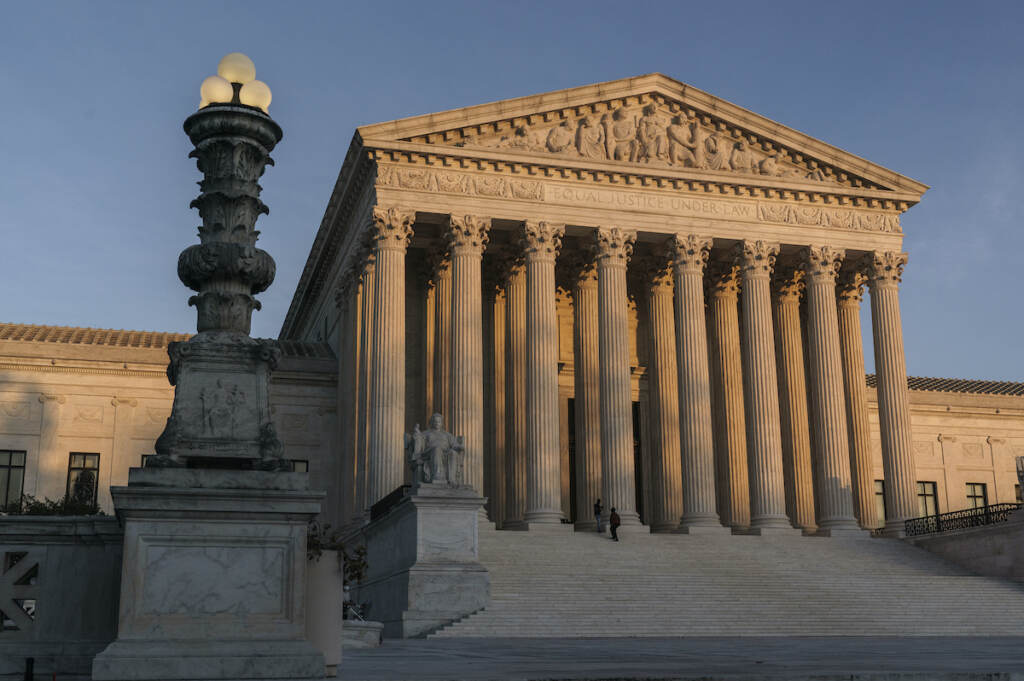 Supreme Court Immigration Deportation Policy File photo: The Supreme Court is seen at sundown in Washington, on Nov. 6, 2020. (AP Photo/J. Scott Applewhite, File)
