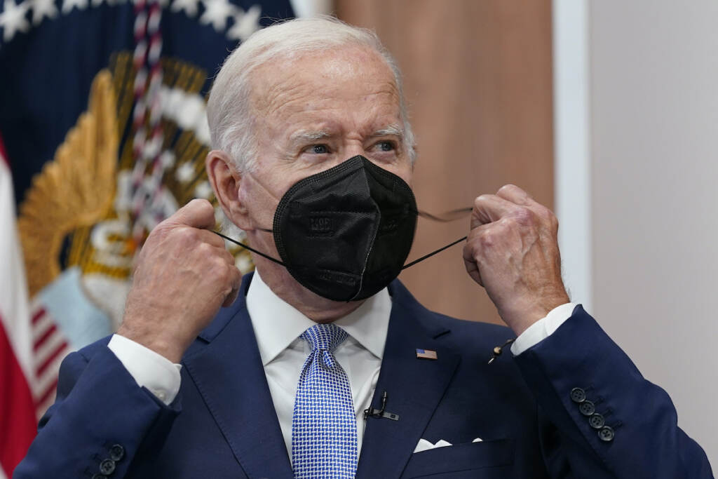 Joe Biden File photo: President Joe Biden removes his face mask as he arrives to speak about the economy during a meeting with CEOs in the South Court Auditorium on the White House complex in Washington, Thursday, July 28, 2022. Biden tested positive for COVID-19 again Saturday, July 30, slightly more than three days after he was cleared to exit coronavirus isolation, the White House said, in a rare case of “rebound” following treatment with an anti-viral drug. (AP Photo/Susan Walsh, File)