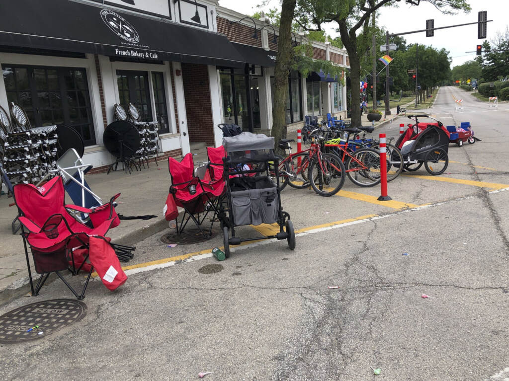 Shooting July Fourth Parade Terrified parade-goers fled Highland Park's Fourth of July parade after shots were fired, leaving behind their belongings as they sought safety, Monday, July 4, 2022, in Highland Park, Ill. (Lynn Sweet/Chicago Sun-Times via AP)