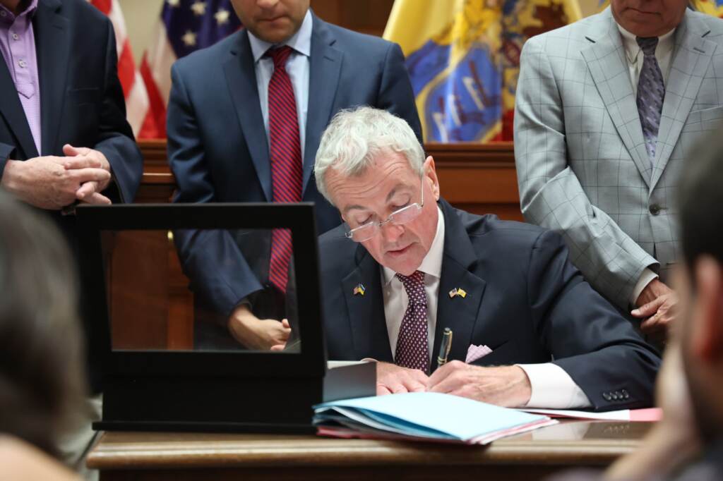 FW61_cXXoAI5K7Q N.J. Gov. Phil Murphy signs a new package of state gun control laws at a press conference in Metuchen, New Jersey on July 5, 2022. (@GovMurphy/Twitter)