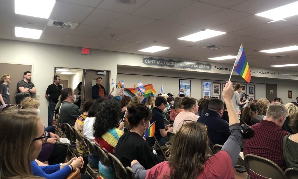 PHOTO9 In May, 2022, Central Bucks parents raise pride flags in protest of the string of decisions made by administration and district leadership. (Emily Rizzo/WHYY)